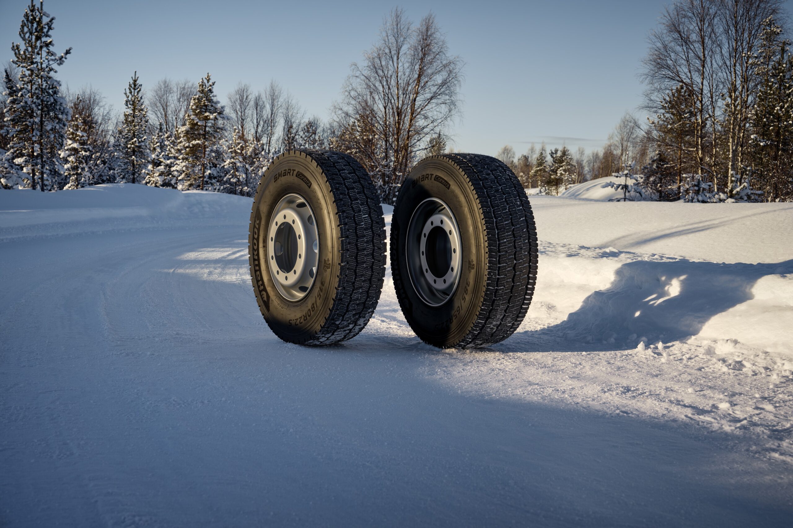 Hankook Smart Control AW53 and DW53 truck winter tyres standing in snow